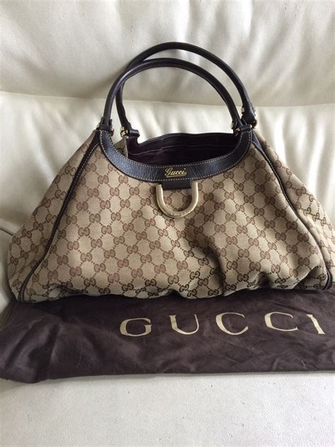 cuanto cuesta una bolsa gucci|cartera gucci original.